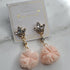 Earring with pompom peach